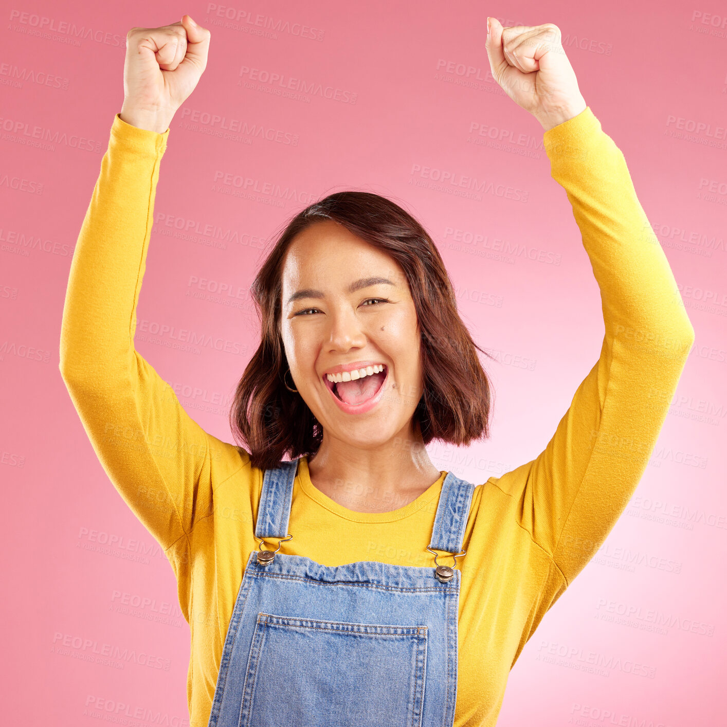 Buy stock photo Happy, celebration and success with portrait of asian woman in studio for party, winner or motivation. Wow, freedom and prize with face of person cheering in pink background for yes, bonus or excited