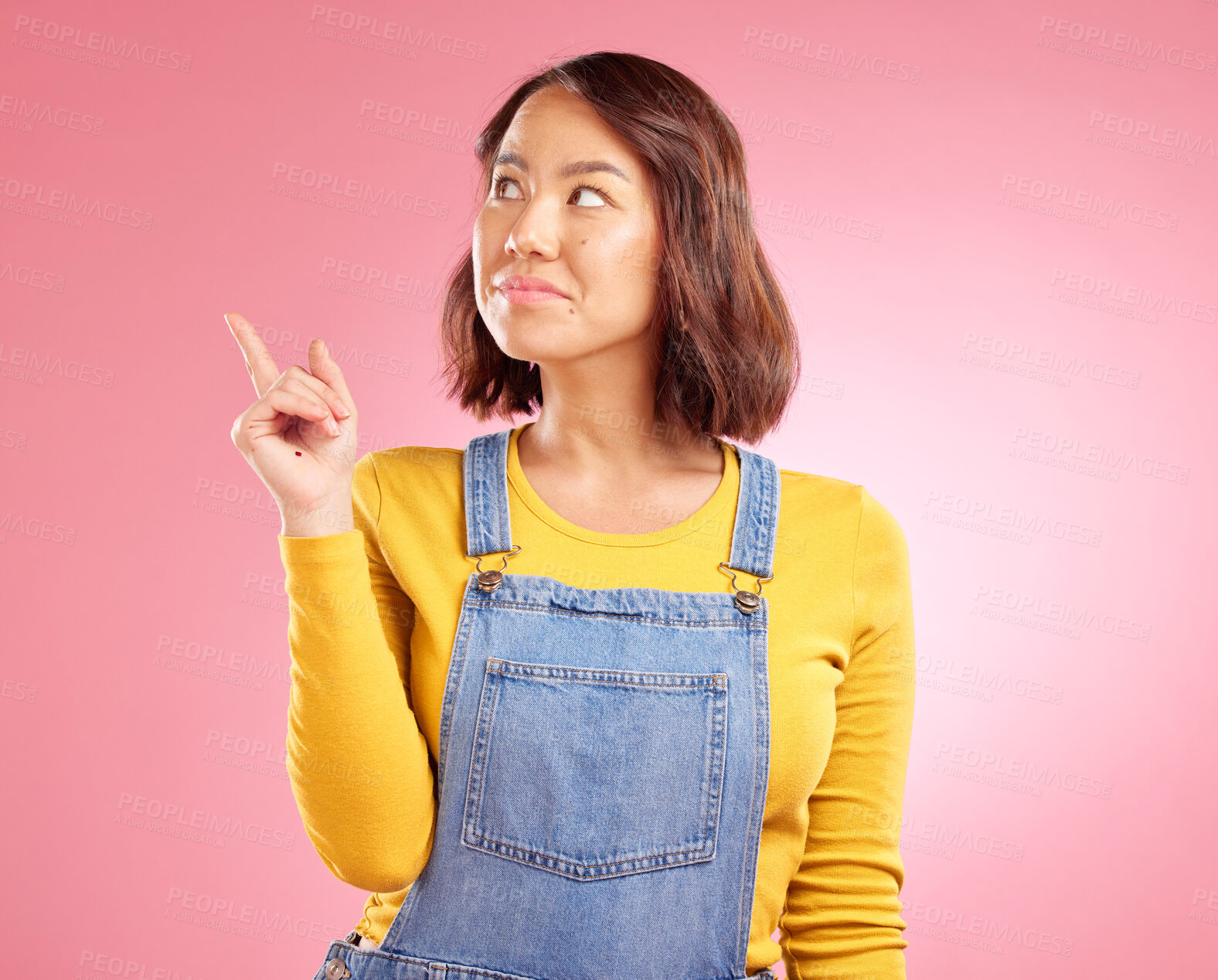 Buy stock photo Asian woman, smile and hand pointing to studio for news, announcement or coming soon deal on pink background. Finger, show and Japanese lady with timeline, checklist or sign up, promo or contact info