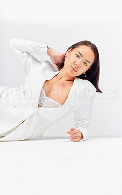 Buy stock photo Fashion, makeup and portrait of a female model in a studio with a formal, classy and fancy outfit. Cosmetic, beauty and young Asian woman with elegant style posing while isolated by white background.