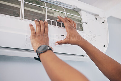 Buy stock photo Hands of person, technician and ac repair for electrical system, fan maintenance and labor. Closeup of mechanic, electrician and engineering services to fix aircon, hvac and air conditioning machine