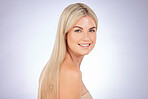 Portrait, blonde and beauty of woman with hair care, natural skincare or aesthetic wellness on studio background. Face, happy female model and dermatology of cosmetics, salon shampoo or healthy shine