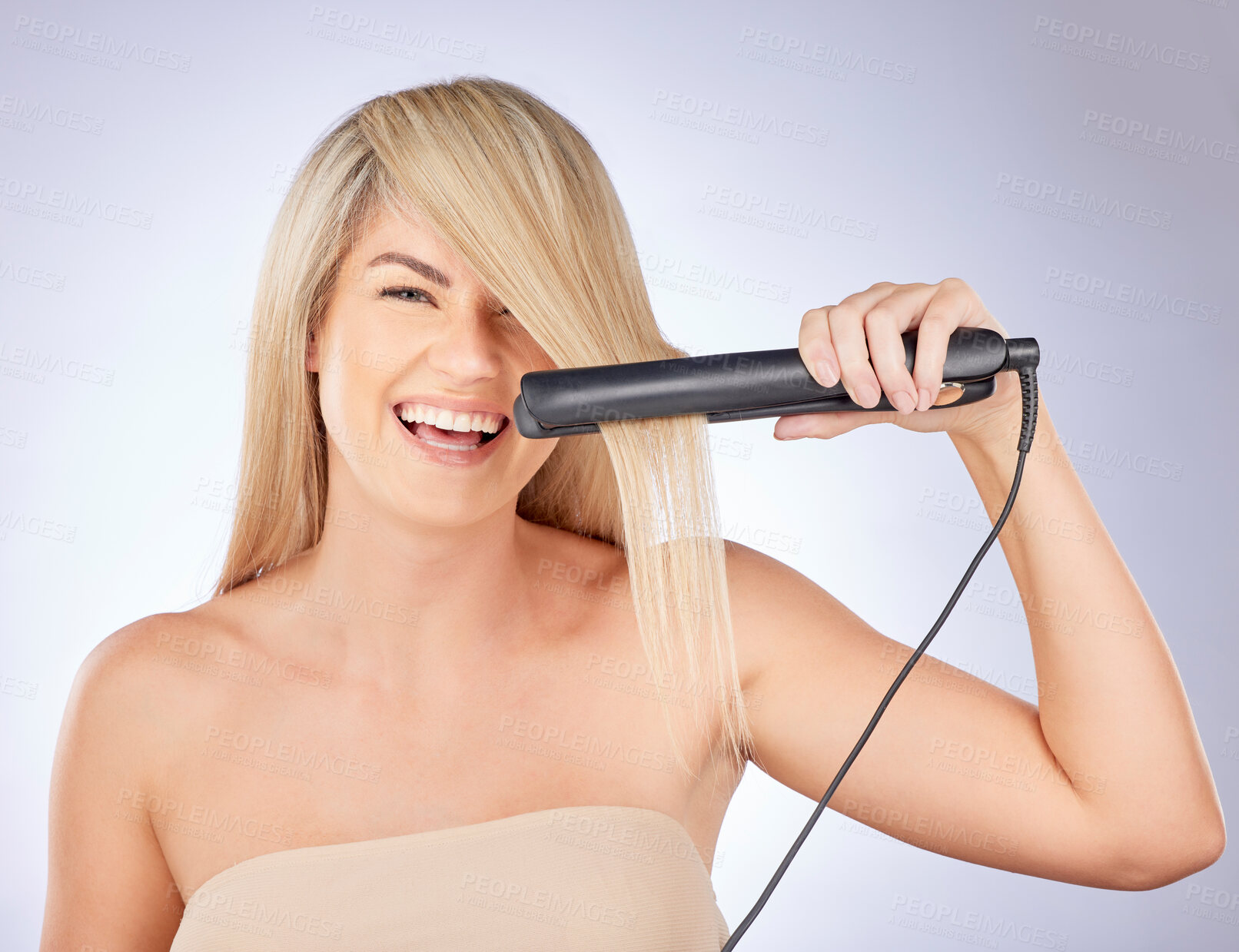 Buy stock photo Portrait, happy hair care and woman with straightener for a professional salon treatment. Smile, health and an excited young model or girl with an iron from hairdresser for a hairstyle on a backdrop