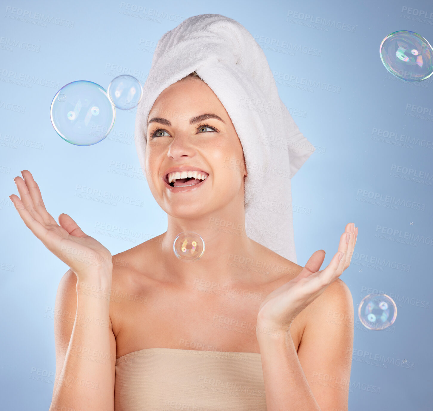 Buy stock photo Happy, studio face and woman with bubbles for skincare, body cleaning bath or morning hygiene wash. Bathroom, beauty happiness or person with smile, wellness or self care hydration on blue background