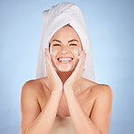 Shower, portrait and woman washing face with soap in studio, blue background and cleaning cosmetics. Happy female model, facial skincare and foam for healthy glow, dermatology and moisturizing beauty