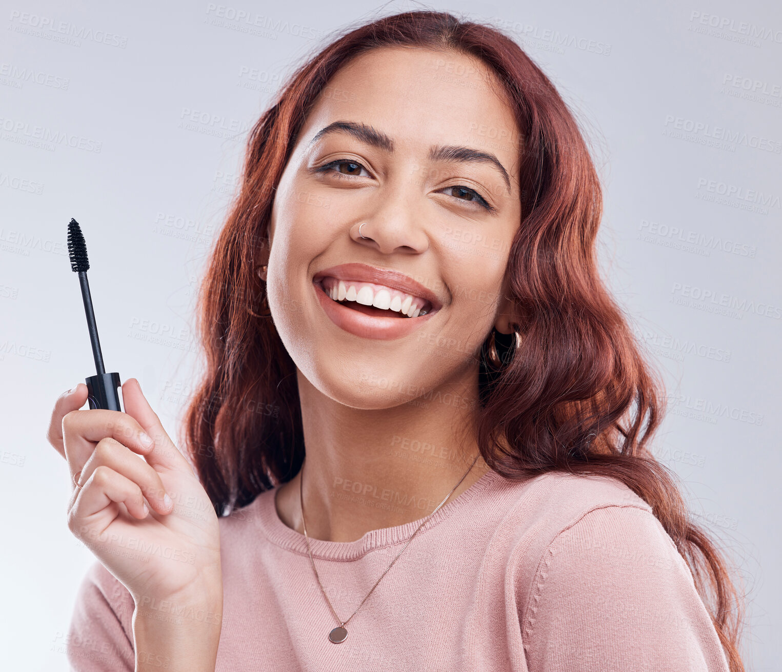 Buy stock photo Portrait, beauty or happy girl with mascara makeup, cosmetics or product brush laughing in studio. Smile, face or woman model smiling with eyelashes tool for make up or self care on white background