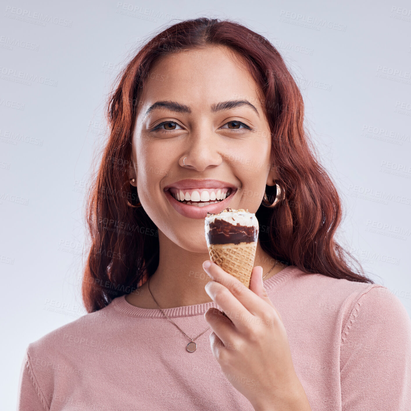 Buy stock photo Happy, ice cream and portrait of woman with smile in studio with dessert, snack and sweet treats. Food, style and face of female person with cone for eating, luxury and summer on gray background