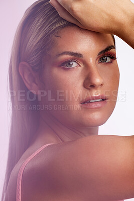 Buy stock photo Makeup, portrait and young woman in a studio with a natural, glamour and beauty face routine. Cosmetic, attractive and female model from Canada with facial cosmetology isolated by a pink background.