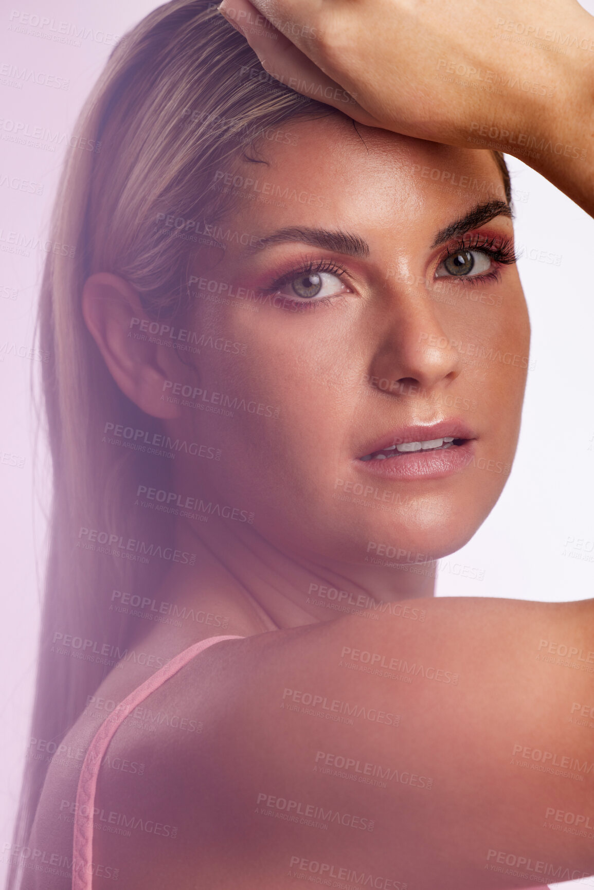 Buy stock photo Makeup, portrait and young woman in a studio with a natural, glamour and beauty face routine. Cosmetic, attractive and female model from Canada with facial cosmetology isolated by a pink background.