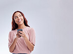 Phone or mockup or happy woman on social media thinking of online dating or chat website for texting. Smile, banner space ideas or gen z female typing on mobile isolated on studio white background