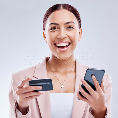 Woman in portrait, credit card and smartphone for online shopping, excited for deal and fintech on white background. Female customer, happy with payment and ecommerce, bank app and discount in studio