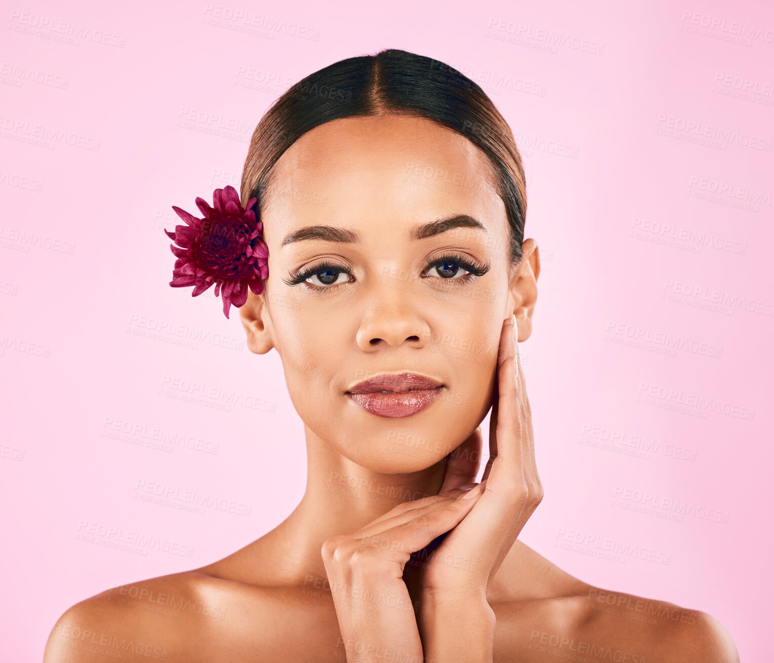 Buy stock photo Skincare, cosmetics and portrait of woman with flower, makeup and wellness glow on pink background. Natural beauty, dermatology and model with luxury facial care and healthy spa aesthetic in studio.