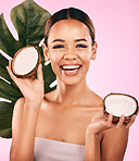 Woman, smile and coconut, natural beauty and palm leaf with sustainable skincare isolated on pink background. Happiness, female model with fruit and eco friendly dermatology, cosmetic care in studio