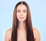 Hair, face and beauty, woman and cosmetic care with keratin treatment isolated on blue background. Female model, haircare and salon hairstyle, Brazilian shine and skin glow with portrait in a studio