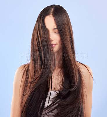 Buy stock photo Beauty, texture and woman with hair care, growth and wellness against a blue studio background. Female person, aesthetic and model with volume, scalp treatment and luxury with shampoo and cosmetics
