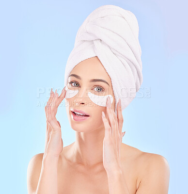 Buy stock photo Beauty, eye pads and portrait of woman in studio for natural, health and wellness routine. Skincare, cosmetic and young female model from Australia with a clean skin treatment by a blue background.