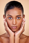Portrait, skincare and beauty with indian girl for dermatology with glow in brown studio background. Natural, face and healthy skin with cosmetics or spa treatment for self care in mock up for shine.