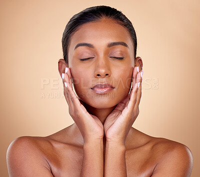 Buy stock photo Relax, skincare or woman with wellness, beauty or natural facial glow with dermatology cosmetics in studio. Eyes closed, background or face of Indian girl model resting with shine or self love