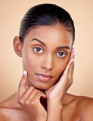 Buy stock photo Portrait, beauty or Indian woman with natural facial glow with dermatology skincare cosmetics in studio. Aesthetic face, brown background or gen z girl model with wellness, shine or self love glow