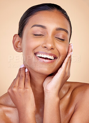 Buy stock photo Skincare, funny and Indian woman with cosmetics, facial and dermatology on a brown studio background. Female person, aesthetic and model with treatment, laughing and shine with self care and wellness