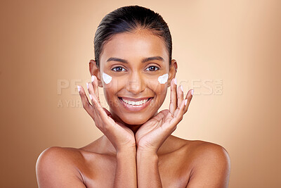 Buy stock photo Facial cream, skincare or portrait of happy woman for aesthetic shine, cosmetics or dermatology on studio background. Indian female model, face lotion or product for healthy beauty, glow or self care