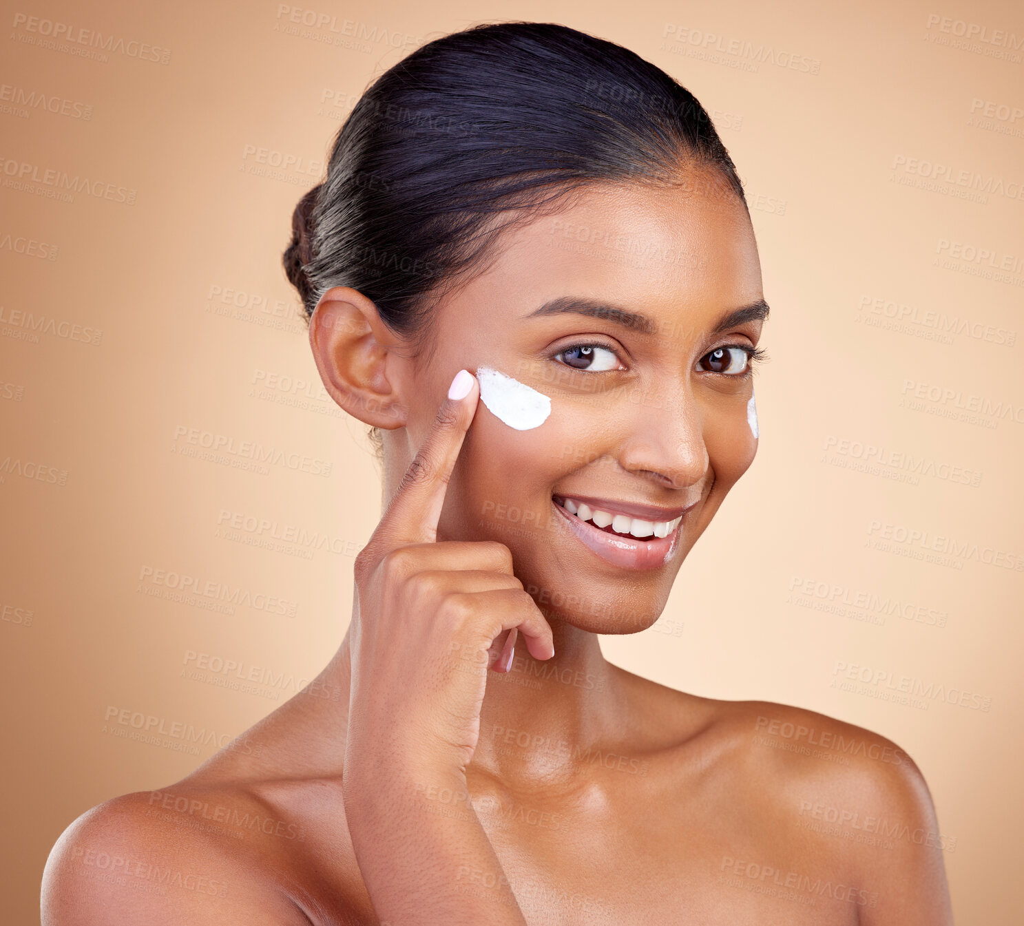 Buy stock photo Face, cream cosmetics and portrait of happy woman for aesthetic shine, skincare or dermatology on studio background. Indian female model, lotion or facial product for clean beauty, glow and self care