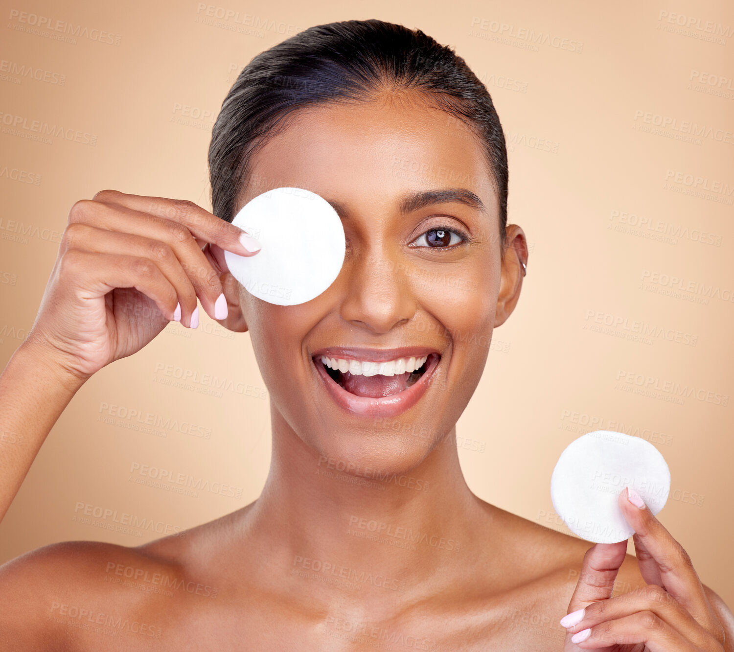 Buy stock photo Happy woman, cotton pad and skincare for eyes, face or aesthetic cosmetics on studio background. Portrait of indian female model, beauty and facial product for makeup, toner wipe or clean dermatology