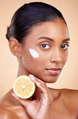 Buy stock photo Woman, portrait and cream with lemon for skincare, cosmetics cleaning and natural beauty product or vitamin c benefits. Face of young person with fruits for dermatology on studio, brown background