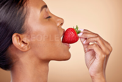 Buy stock photo Eating, strawberry and profile of woman for skincare with natural beauty or benefits from healthy nutrition, diet and fruit. Girl, bite of food and vitamin c for skin to glow, shine or wellness