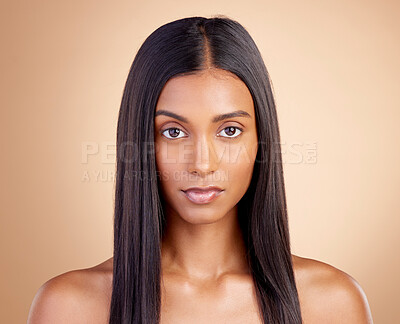 Buy stock photo Portrait, hair care and Indian woman with beauty, cosmetics or texture on a brown studio background. Face, female person or model with cosmetology, shine or scalp treatment with aesthetic or skincare