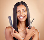Hair care, happy and portrait of a woman with tools for a haircut, grooming or salon treatment. Smile, Indian and a young model or girl with gear for a hairstyle isolated on a studio background