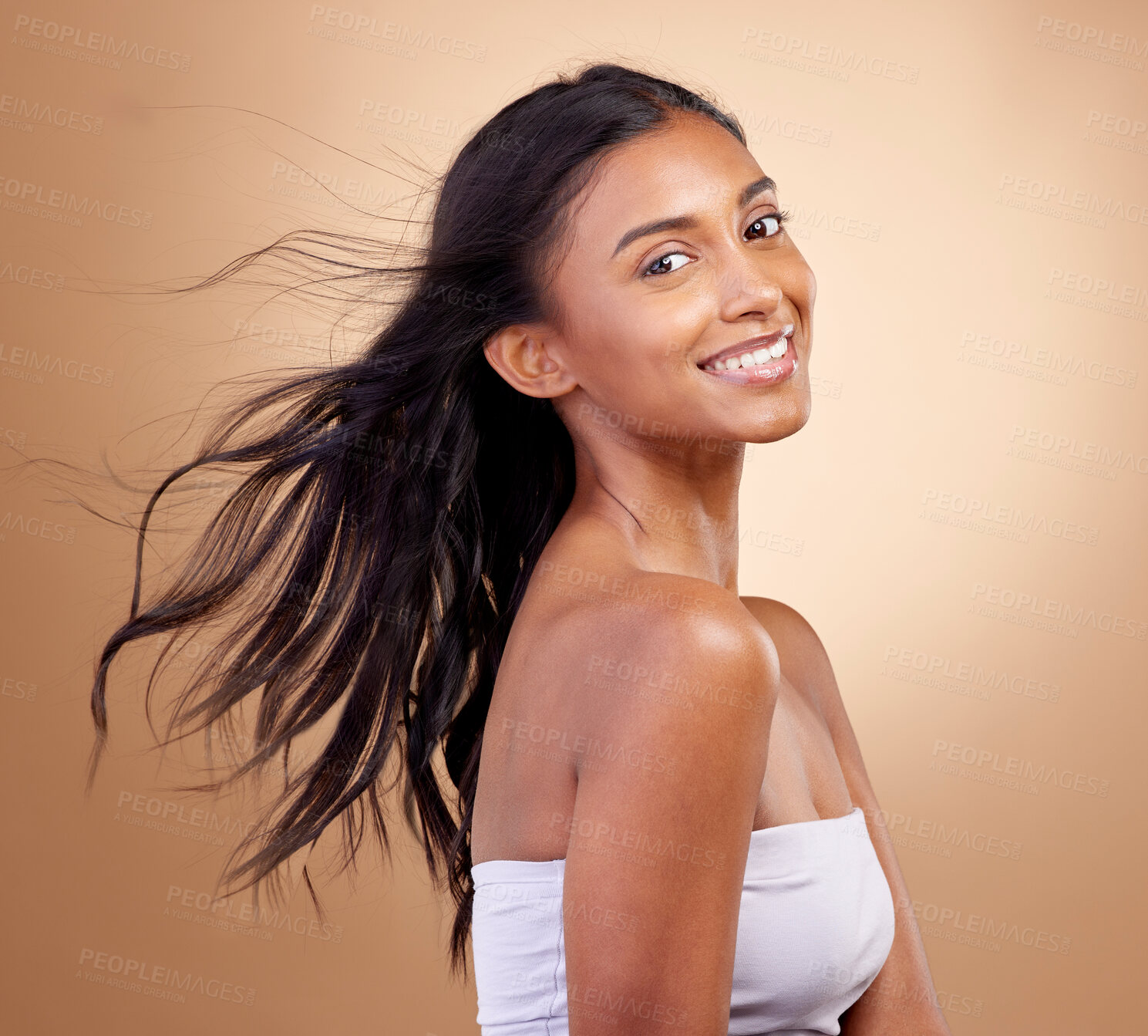 Buy stock photo Portrait, haircare and salon for indian woman with beauty in brown studio background with glow. Hairstyle, happy face and girl with shine or keratin treatment, volume and natural cosmetic in mockup.