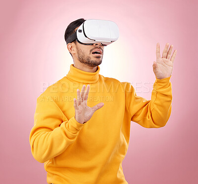 Buy stock photo VR, glasses and man vision on studio pink background for software, digital world or user experience. Person with high tech gaming, wow and surprise for virtual reality, future technology or metaverse