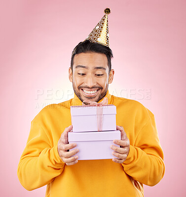 Buy stock photo Man, winner and gift box, birthday celebration and prize or giveaway success and shopping on pink background. Happy person with present, party package and retail competition for discount in studio