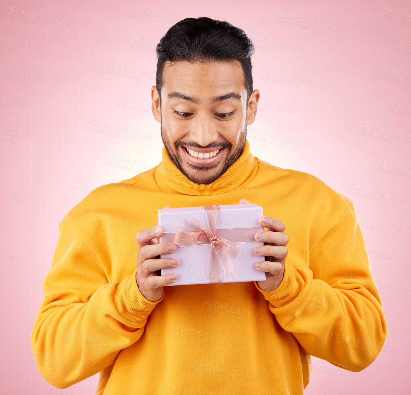 Buy stock photo Man, winner and excited for gift box, prize and giveaway celebration or birthday surprise on pink background. Happy person with present, package and retail shopping or competition success in studio