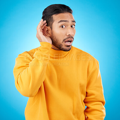 Buy stock photo Attention, surprise and asian man with listening to news with asian in studio background for information. Secret, hearing and hand on ear with male person or shocked face in mock up with gossip.