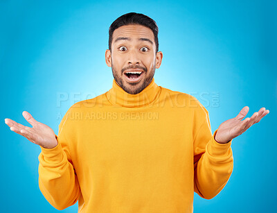 Buy stock photo Wow, portrait and asian man in studio with hands for choice, decision or questions on blue background. Palm, scale and face of male customer confused, asking or why emoji for choosing, option or deal