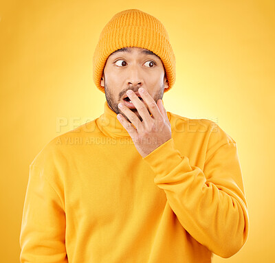 Buy stock photo Surprise, hand and asian male shocked by winter, fashion and sale announcement in studio on yellow background. Wtf, worry and Japanese male customer with omg deal, news or coming soon promotion