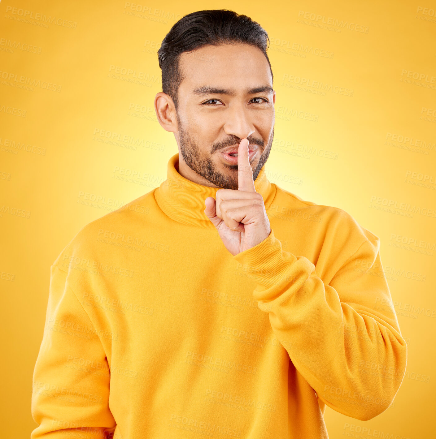 Buy stock photo Secret, man and finger on lips for gossip, confidential information or sign with hand for whisper in studio or yellow background. Announcement, emoji or person for communication or silence of sound