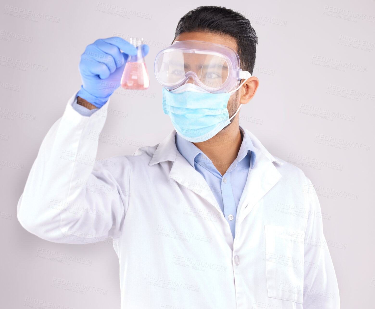 Buy stock photo Medical, chemical and man with research, test and scientific breakthrough against a white studio background. Research, male person and model with safety, cure and container with liquid and chemistry