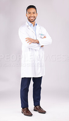 Buy stock photo Portrait, man and happy scientist with arms crossed in studio isolated on a white background. Confidence, smile and Asian doctor, science expert or medical professional from Singapore on mockup space