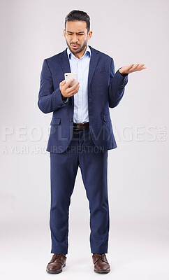 Buy stock photo Phone, problem and asian man in studio confused with scam, alert or internet delay on grey background. Stress, smartphone and online glitch for Japanese guy frustrated by spam, phishing or 404 glitch