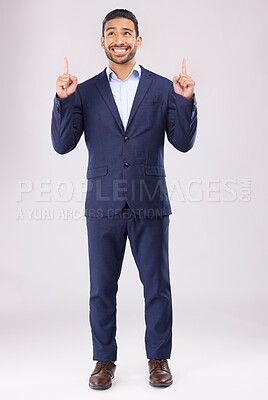 Buy stock photo Happy, pointing and presentation with business man in studio for idea, advertising and news. Solution, space and announcement with person on white background for promotion, mockup and information