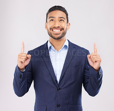 Buy stock photo Smile, hand pointing and asian man in studio with sale, announcement or coming soon promo on grey background. Happy, news and Japanese male show launch, platform and giveaway, process or review info