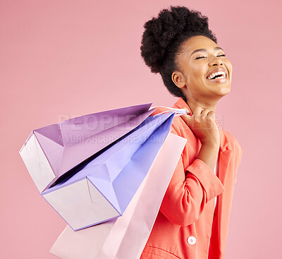 Buy stock photo African woman, studio and smile shopping bag with discount, sale and thinking by pink background. Young gen z girl, retail promotion and happy for deal, customer experience and fashion for gift idea