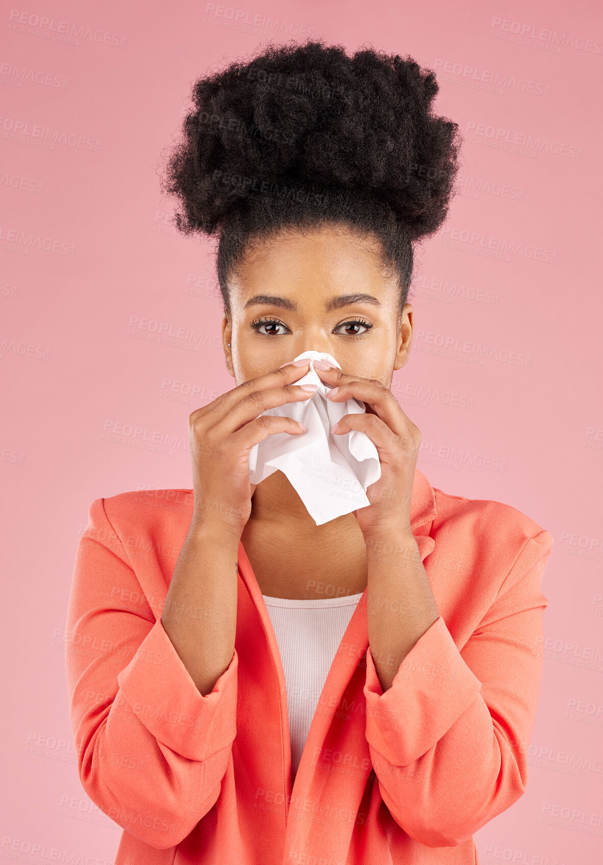 Buy stock photo Woman, tissue and sneeze in studio portrait for healthcare, hygiene and allergy by pink background. African gen z girl, sick student or model with toilet paper, blowing nose or cleaning for self care