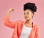 Portrait, black woman and flex for power, winning and empowerment against a studio background. Face, female person and model with strength, arm muscle and achievement with success, strong and energy