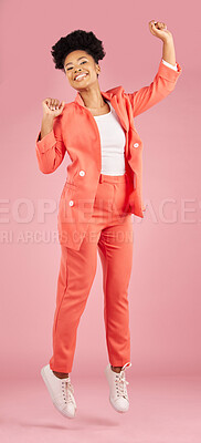 Buy stock photo Portrait, fashion and jumping with an afro woman in studio isolated on pink background for trendy style. Smile, excited and celebration with a happy young african person winning in a clothes outfit