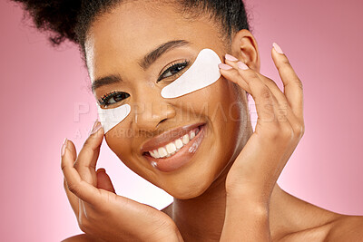 Buy stock photo Woman, smile and eye patch for skincare in studio portrait with beauty, cosmetics or product by pink background. Girl, model and facial self care with hands, natural skin glow or aesthetic for health