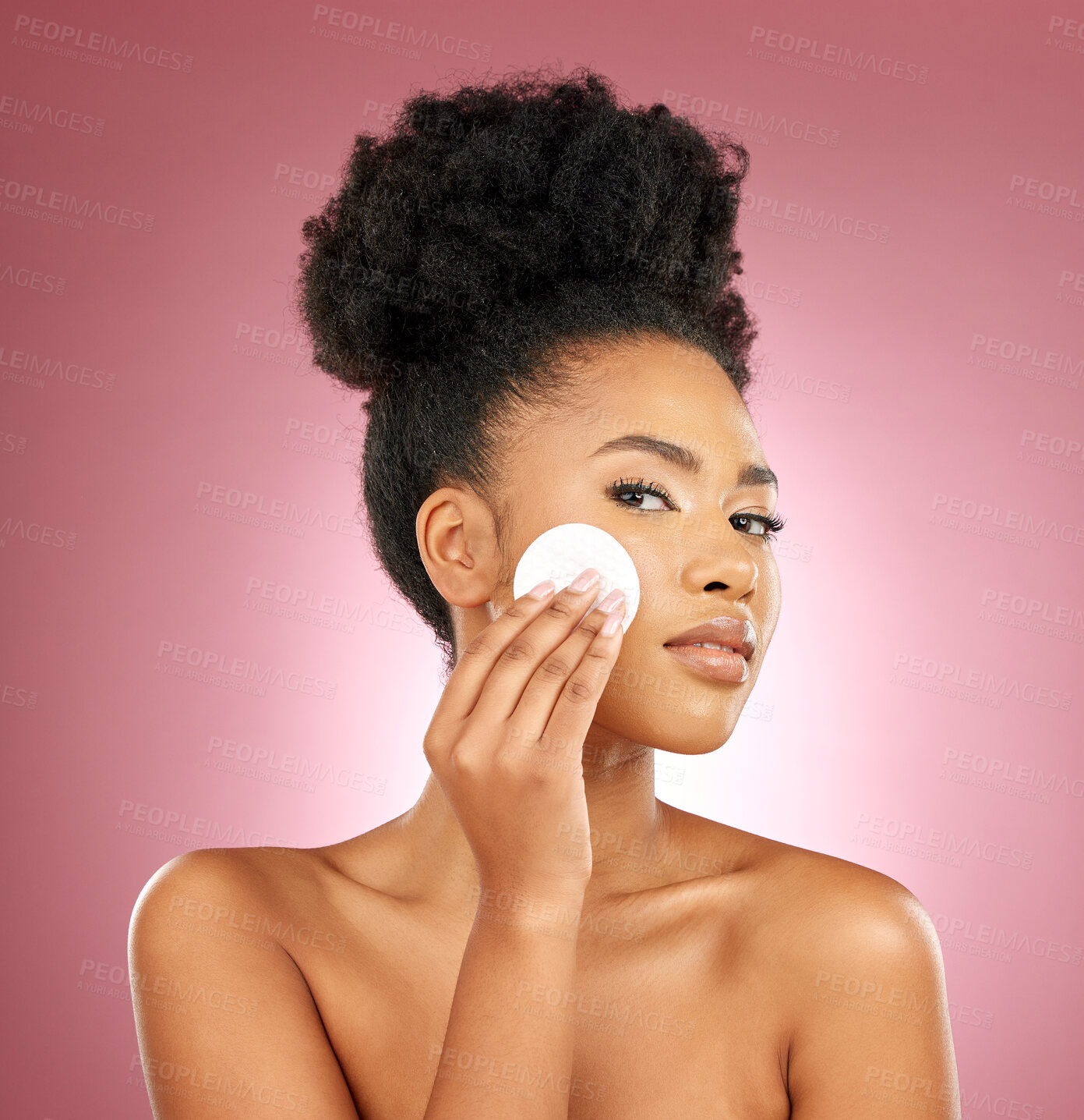 Buy stock photo Black woman, cotton pad and portrait with makeup, dermatology and skincare on a studio background. Female person, shine and model with cosmetics, aesthetic and cleaning with beauty, glow and patches