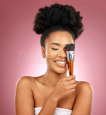 Buy stock photo Makeup, smile and black woman with brushes, facial and dermatology against a studio background. Female person, aesthetic and happy model with cosmetic tools, natural beauty and grooming with skincare